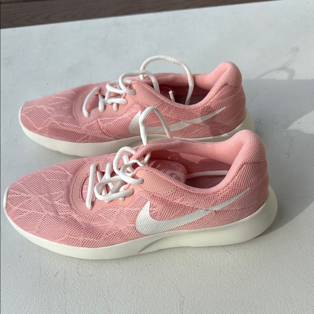 Nike Pink and White Sneakers with Textured Fabric